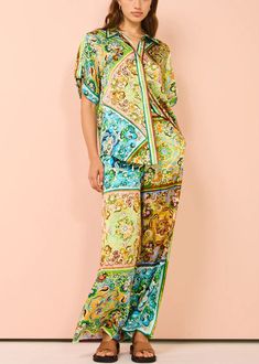 Fabric: Cotton BlendedSize & Fit: Fit: This garment fits true to size.Length: Size L measures 30.03"from shoulder to hemBust: Great for any cup size. Waist: Loose Fit. Comfortable room throughout midsection.Hip: Loose Fit - room for hips. Hand Wash Cold. Multicolor Printed Blouse For Loungewear, Printed Multicolor Blouse For Loungewear, Green Short Sleeve Blouse For Loungewear, Multicolor Floral Print Short Sleeve Sleepwear, Multicolor Short Sleeve Sleepwear With Floral Print, Multicolor Floral Print Sleepwear With Short Sleeves, Green Printed Top For Loungewear, Relaxed Fit Multicolor Floral Print Sets, Multicolor Floral Print Relaxed Fit Sets