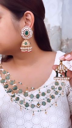 Crafted with intricate melon-shaped beads, this versatile piece is perfect for layering with your favorite jhumkas, studs, or long earrings.

Whether you’re attending a wedding or simply want to add a touch of ethnic flair to your festive look our Pushkar ear cuff is the perfect accessory. Earring With Hair Chain, Diy Hair Accessories Tutorial, Hair Accessories Tutorial, Wire Ear Cuffs, Ear Cuff Chain, Jewelry Kundan, Ear Chain, Bridal Choker, Gold Jewelry Stores