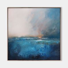 an abstract painting with blue and white colors on the water, in a gold frame