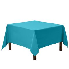 a blue table cloth on top of a wooden table