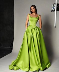 Make a statement in our Priscila Gown. Crafted from Spandex Satin, this elegant A Line dress features a rich green hue that is sure to turn heads at any evening event. With its long length, it is perfect for proms or parties. Exude sophistication and grace with our exclusive gown. Taffeta Ball Gown, Brocade Ball Gown, Exclusive Gowns, Ballroom Gowns, Chic Evening Dress, Robes Glamour, Satin Ball Gown, Green Gown, Looks Street Style