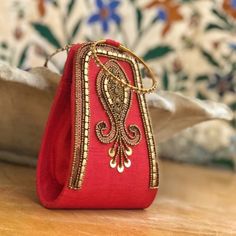 I Found This Beautiful Ornate Handcrafted Red Hand Beaded With Sequins Wristlet Bag In A Merchants Shop On The Side Of The Road On My Way From Visiting The Taj Mahal In India. There Is Only 1 With In This Red Combination Available. Wear Effortlessly Around Your Wrists With The Ornately Detailed Attached Bangles. Perfect Accessory To Dress Up Any Outfit. 6”H X 4.5” W X 2.5” D 2.75” Bangle Diameter Embroidered Red Pouch Clutch, Red Embroidered Pouch Clutch, Red Pouch Clutch For Festivals, Rectangular Evening Wristlet, Red Embroidered Clutch For Festive Occasions, Elegant Clutch Wristlet As Gift, Elegant Clutch Wristlet For Gift, Gold Rectangular Wristlet For Gifts, Red Clutch For Party And Festivals