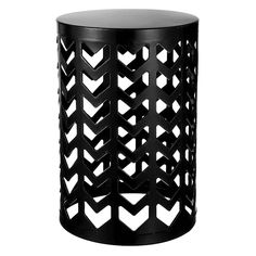 a black side table with an intricate design