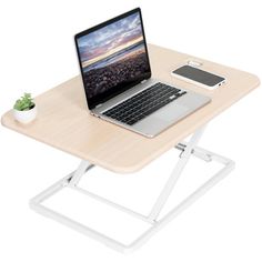 Enjoy an ergonomic workspace with the Single Top Desk Riser from VIVO! This single-tiered platform sits on top of your current desk and gives you the benefit of standing or sitting on demand. The compact size saves space on your table top while allowing you to raise the height of your monitor (or laptop) and keyboard. Transitioning between sitting and standing throughout the long work day provides numerous benefits, such as increased blood flow, reduced aches and pains, and heightened alertness Whiteboard Table, Laptop Light, Standing Desk Riser, Guest Bedroom Home Office, Desk Riser, Electric Desk, Monitor Riser, Table Surface, Computer Workstation