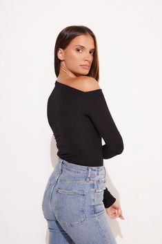 Details Scarlett, our new sultry style features an asymmetrical shoulder detail and sits on the natural waistline with extra long sleeves. Made in LA Pre-Washed Fitted Cold Shoulder Off-shoulder Top For Fall, Fitted Cold Shoulder Top For Fall, Fitted Black Off-shoulder Long Sleeve Top, Fitted Black Long Sleeve Off-shoulder Top, Chic Fitted Long Sleeve Off-shoulder Top, Fitted Off-shoulder Top For Night Out In Spring, Spring Off-shoulder Top For Night Out, Chic Fitted Off-shoulder Top For Fall, Fitted Chic Off-shoulder Top For Fall