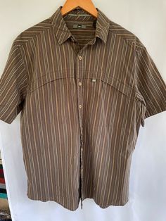 REI - Short Sleeve Button Hiking Shirt 100% Cotton BROWN SIZE MEDIUM. Condition is "Pre-owned". Shipped with USPS First Class. Brown Tops With Button Closure For Outdoor, Casual Brown Tops For Outdoors, Brown Casual Tops For Outdoor, Casual Brown Tops For Outdoor, Casual Outdoor Shirt With Buttons, Casual Shirt With Button Closure For Outdoor, Casual Brown Camp Shirt With Pockets, Brown Casual Shirt With Relaxed Fit, Casual Brown Tops With Button Closure