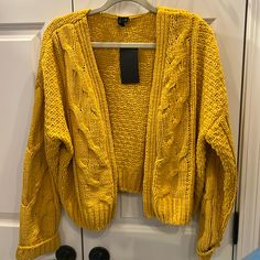 Chenille Open Front Cardigan. Mustard Color Yellow Open Front Cardigan For Spring, Yellow Knit Outerwear For Spring, Yellow Cable Knit Top For Fall, Yellow Open Front Cardigan For Fall, Yellow Long Sleeve Cardigan For Spring, Yellow Long Sleeve Cardigan For Fall, Mustard Long Sleeve Cardigan For Spring, Casual Mustard Cardigan For Spring, Fitted Yellow Cardigan For Fall