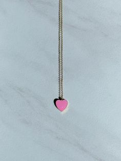 Small enamel gold heart charm on a 14k gold-plated or 14k gold filled chain necklace. Chain is 16 inches long and includes a two-inch extender chain. Cute Rose Gold Necklace With Heart Charm, Pink Heart Pendant Dainty Jewelry, Pink Dainty Jewelry With Heart Charm, Dainty Pink Jewelry With Heart Beads, Pink 14k Gold Filled Jewelry Gift, Pink 14k Gold Filled Jewelry For Gift, Pink Charm Necklaces For Everyday Wear, Pink Heart Charm Necklace For Gift, Dainty Pink Gold Heart Necklace