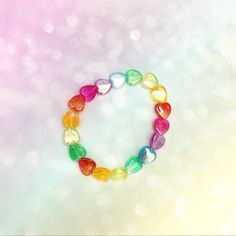 Rainbow heart kandi bracelet! A great accessory to make any outfit cuter 🌸 🌟Waterproof 🌟Elastic string Made with: 🌟heart beads If your size is not listed above, please add personalization in inches. Thank you! Kandi Bracelets, Star Bracelet, Rainbow Heart, Cute Packaging, Heart Beads, Button Pins, Pink Heart, Jewelry Bracelets, How To Find Out