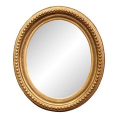 a gold framed mirror with beading around the edges and an oval frame, on a white background