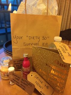 a paper bag sitting on top of a wooden table next to bottles and condiments