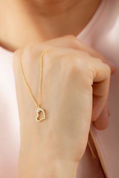 Dainty Gold Diamond Minimalist Heart Necklace Pendant, 14k Gold Diamond Necklace, Tiny Heart Love Necklace Valentines Day Gift for Her  FEATURES• Solid Gold (real gold, not gold plated or gold filled material)• Gold Karat: 10K (417) - 14K (585) - 18K (750) (optional)• Pendant Height: 0.44 Inches (1.12 cm)• Pendant Width: 0.38 Inches (0.96 cm)• Available Gold Color: Yellow gold, rose gold and white gold (optional)• Diamond weight: 0.015 ct• Diamond color: G-H Color• Diamond clarity: SI• Necklace Gold Heart Necklace With Birthstone In Dainty Style, Gold Heart Necklace With Birthstone, Dainty Style, Gold Dainty Heart Necklace With Birthstone, Elegant 14k Gold Heart Necklace With Birthstone, Dainty Gold Heart Necklace With Birthstone, 14k Yellow Gold Heart Necklace Gift, 14k Gold Open Heart Necklace For Her, Delicate 14k Gold Heart Necklace For Anniversary, Yellow Gold Heart Necklace With Birthstone For Her