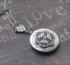 Silver Locket Necklace, Celtic Jewelry, Photo Picture Locket, Locket For Her, Celtic Wedding, Trinity Necklace, Mother of Three, Locket Gift This enchanted necklace features a beautiful locket adorned with an ornate silver filigree cabochon and rosary style connector. The chain measures 18 inches long and is secured with a lobster clasp. The locket is 1 and 1/4 inches tall and has space for two photos or anything else you choose to put inside. All plated in silver with an oxidized finish. Very h Victorian Wedding Necklace Nickel-free, Victorian Style Nickel-free Necklace For Weddings, Victorian Wedding Necklace Nickel Free, Victorian Nickel-free Wedding Necklace, Victorian Style Nickel-free Wedding Necklace, Victorian Bracelet Jewelry For Wedding, Victorian Style Bracelet Jewelry For Wedding, Adjustable Vintage Charm Wedding Jewelry, Adjustable Vintage Charm Jewelry For Wedding