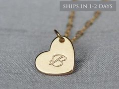 "This beautiful and personalized gold heart necklace would be a perfect graduation present or a gift for any loved one! The gold plated heart charm measures approximately 21x16mm (including jump ring) and is hung on a 16\", 18\" or 20\" gold plated or 14k gold filled chain. The chains are dainty and very pretty - the perfect delicate necklace for everyday wear. You can also add multiple hearts to the necklace. This sweet necklace is sure to be one of the recipient's favorite pieces of jewelry! I Customizable Heart Pendant Charm Necklaces For Gifts, Customizable Heart Charm Necklaces For Gifts, Heart-shaped Gold Necklace For Best Friend, Customized Heart Pendant Necklace For Gift, Gold Heart Pendant Necklace For Best Friend, Personalized Initial Pendant Heart Necklace For Gift, Personalized Initial Pendant Heart Necklace Gift, Heart Pendant Name Charm Necklace As Gift, Double Heart Charm Necklace Valentine's Day Gift