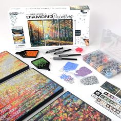 the diamond painting kit is open and ready to be put into its package, with other supplies