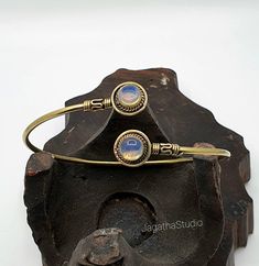 HANDMADE  Beautiful Boho, hippie handcrafted arm cuff bracelet with detailed and Beautiful gemstones  This piece has some beautiful work  Handmade with high quality hypoallergenic Jewelery brass, nickel free. Adjustable, it will fit any size. Aprox diameter round gemstone piece: 1.3 cm LINK Don't miss the rest of the collection, please follow the link.  https://www.etsy.com/uk/shop/JagathaStudio Nickel Free Bohemian Bracelets, Nickel-free Bohemian Bracelets, Bohemian Brass Bracelet Jewelry, Bohemian Brass Bracelet, Adjustable Brass Beaded Bracelets, Handmade Adjustable Spiritual Bangle, Handmade Adjustable Artisan Bangle, Unique Adjustable Hand Wrapped Bangle, Adjustable Bohemian Brass Bracelets