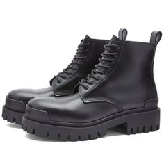 Feel powerful with every wear in this pair of Balenciaga boots. With a slick leather upper, they’re styled with a heel pull tab and laces for a secure fit, while a durable rubber sole adds a combat-ready touch..Leather Uppers.Heel Pull Tab.Rubber Outsole Ankle-high Combat Boots With Reinforced Heel For Streetwear, Fall Lace-up Boots With Vibram Sole, High-top Leather Boots With Lace-up Fastening, Leather High-top Boots With Lace-up Fastening, High Ankle Lace-up Boots With Vibram Sole For Fall, Leather Platform Boots With Front Lace-up For Streetwear, Leather Platform Boots With Lace-up Fastening For Streetwear, High Ankle Lace-up Boots With Reinforced Heel For Streetwear, Streetwear High-top Lace-up Boots With Reinforced Heel