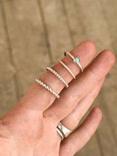 These rings are made of .925 sterling silver. I am new to silverwork, so please give me grace with sizing & my welding! Nonetheless, these rings are beautiful, simple, dainty stackers. They can be daily wearers, as they’re super comfortable! If you are purchasing 3 or more, check out my other listings for a set of 3, for a discount! These rings are handmade to order, so please allow 1-2 weeks before your order is shipped. Stackable Silver Midi Rings With Round Band, Silver Stackable Midi Rings With Round Band, Dainty Sterling Silver Midi Rings With Birthstone, Dainty Stackable 925 Silver Rings For Promise, Sterling Silver Midi Rings With Birthstone, Sterling Silver Stackable Toe Rings In Silver, Nickel Free Sterling Silver Stackable Rings, Minimalist Sterling Silver Toe Rings For Anniversary, Sterling Silver Midi Rings Stamped 925