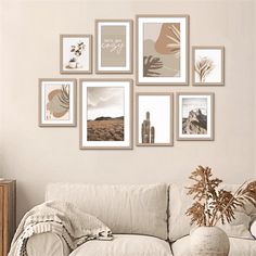 a living room filled with white furniture and pictures on the wall above it's couch