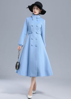 "How elegant the coat is! The blue wool coat was designed with a A-line silhouette and a fitted waist. It is made from blue wool blend fabric ,This warm winter coat is crafted with a high collar so it can keep you warm in cold weather. The midi coat open by front buttons. the belt loops can adjust the waist size. two side pockets and double breasted on it , it is handmade by Xiaolizi, more color available if you need, just write to us. DETAIL * More color optional https://etsy.me/3AwTfvZ * 50% w Spring Wool Coat For Office With Buttons, Blue Double-breasted Wool Pea Coat, Blue Single-breasted Wool Coat For Spring, Elegant Blue Solid Color Outerwear, Spring Wool Coat In Solid Color, Light Blue Winter Outerwear With Buttons, Elegant Blue Double-breasted Wool Coat, Elegant Blue Long Sleeve Wool Coat, Elegant Long Sleeve Blue Wool Coat