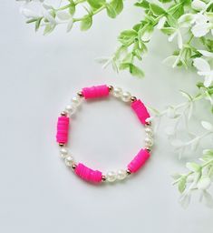 This bracelet is super cute and is inspired by barbie Elegant Pink Bangle Stretch Bracelet, Pink Friendship Bracelet Jewelry, Trendy Pink Beaded Bracelets For Party, Trendy Pink Stretch Bracelet For Party, Trendy Pink Jewelry With Bracelet Strap, Pink Adjustable Charm Bracelet For Parties, Adjustable Pink Charm Bracelet For Party, Pink Adjustable Stretch Bangle Bracelet, Adjustable Pink Stretch Bangle Bracelet