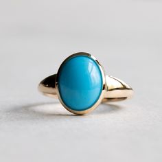 Sleeping beauty blue turquoise set on 18k yellow gold. Metal: 18k Gold Stone: Sleeping beauty turquoise Stone Shape: Oval Stone Size: 8mm x 10mm Band Width: Approx 1.4mm band width This ring is customizable with your choice of gemstones. Please contact us for custom work. LEAD TIME: Made to order will take 10-14 days. Luxury Turquoise 14k Gold Ring, 14k Gold Blue Oval Cabochon Rings, Blue 14k Gold Oval Cabochon Rings, Yellow Gold Turquoise Ring With Polished Finish, Luxury Turquoise Cabochon Ring In Yellow Gold, Luxury Yellow Gold Turquoise Cabochon Ring, Blue Cabochon 14k Gold Ring, Blue 14k Gold Oval Cabochon Jewelry, 14k Gold Blue Cabochon Rings