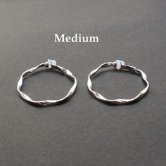 Twisted hoops clip on earrings, clip on earrings, silver clip on earrings, non pierced earrings, clip on hoop earrings, comfortable clip on 🌟More pierced look and comfortable invisible clip on earrings are available at MiyabiGrace home page. Please click the link below https://www.etsy.com/shop/MiyabiGrace ✨There are more clip on hoop earrings. https://www.etsy.com/jp/shop/MiyabiGrace?show_panel=true&section_id=15839676 ✨Here is the invisible clip on hoop earrings. https://www.etsy.com/jp/s Silver Clip-on Metal Cartilage Earrings, Minimalist Silver Clip-on Cartilage Earrings, Adjustable Silver Clip-on Cartilage Earrings, Minimalist Silver Clip-on Jewelry, Minimalist Sterling Silver Clip-on Hoop Earrings, Metal Small Hoop Clip-on Earrings, Minimalist Adjustable Silver Clip-on Earrings, Silver Huggie Clip-on Hoop Earrings, Silver Huggie Hoop Earrings Clip-on