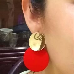 Pretty Gold & Red Disc Earrings Trendy Red Metal Earrings, Trendy Red Circular Jewelry, Red Round Metal Earrings, Modern Red Round Earrings, Trendy Red Party Earrings, Modern Red Earrings For Party, Modern Red Party Earrings, Bold Red Drop Earrings, Chic Red Earrings