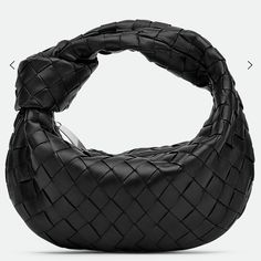 Coolest Bag! The Bottega Veneta Mini Jodi In Black With Silver Hardware. Amazing Basically New Condition. Comes With Box And Tag. Venetta Bottega Bags, Designer Woven Leather Shoulder Bag For Evening, Luxury Woven Leather Bag For Evening, Designer Black Bag With Intrecciato Weave, Luxury Black Bags With Intrecciato Weave, Luxury Hobo Bag With Braided Handles, Black Intrecciato Weave Pouch Shoulder Bag, Evening Bags With Woven Leather And Round Handle, Evening Bag With Woven Leather And Round Handle