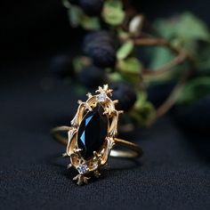 Inspired by Milan Cathedral, this ring is adorned with a natural marquise black onyx and embellished with natural white diamonds. Handcrafted in 14K gold and 18K gold. 14K or 18K solid gold 10*5mm Natural black Onyx Natural round diamonds. 0.02ct. SI clarity, GH color 1.4mm ring band ** This item is specially made for you. Please allow 1-2 week lead time. Shipping:Domestic: Free standard shipping within the U.S.International: Free standard shipping for orders over $200Customization:- Interested Goth Engagement Rings, Gothic Wedding Rings, Milan Cathedral, Gothic Engagement Ring, Onyx Engagement Ring, Cute Engagement Rings, Dope Jewelry, Dream Engagement Rings, Black Onyx Ring