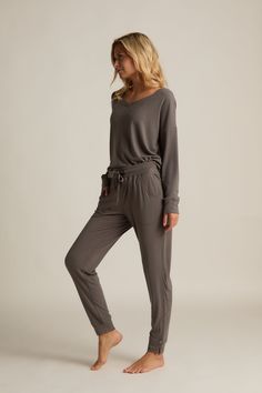 Our new Söft Collection starts with the softness of bamboo. Söft Lounge leggings and a tank with bralette have just enough stretch to hug you gently but let you be free. The entire collection is softer than soft. It’s Faceplant Söft. Söft joggers have non-binding elastic and drawstring waist for easy lounging. Scooped side pockets Side slits at cuffs fit comfortably over your ankles. Tight enough to look sleek but loose enough to feel cozy. Söft charcoal and Söft grey color selections flow beaut Versatile Yoga Pants For Lounging, Versatile Relaxed Fit Yoga Pants For Lounging, Comfy Activewear Long Pants For Lounging, Comfy Activewear For Lounging, Versatile Comfortable Activewear For Relaxation, Comfortable Versatile Activewear For Relaxation, Comfortable Solid Color Yoga Pants For Lounging, Solid Color Comfort Stretch Yoga Pants For Loungewear, Comfort Stretch Solid Yoga Pants For Loungewear