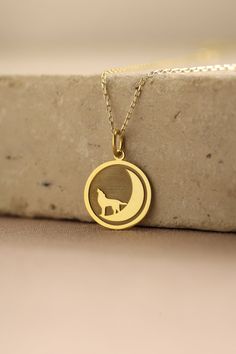 Gold Wolf Pendant - Wolf Gold Necklace ● Material of pendant: Solid Gold 14k ( REAL GOLD ) ● Metal Stamp: 14k ( REAL GOLD ) ● The pendant is available in 5 sizes: - 12,7 mm / 0.5 inches (Diameter) - 14,0 mm / 0,55 inches ( Diameter ) In the photos - 15,3 mm / 0.6 inches ( Diameter ) - 16,5 mm / 0,65 inches ( Diameter ) - 19,1 mm / 0,75 inches ( Diameter ) ( In the photos the size is 14mm / 0.55 inches Diameter ) ( Jump Ring inner diameter: 4 mm ) ● Material of chain: Solid gold 14k ( REAL GOLD ) Celestial Round Pendant Jewelry With Hallmark, Engraved Moon Shaped Necklace For Anniversary, Engraved Moon Necklace For Anniversary, Engraved Moon Shaped Anniversary Necklace, Yellow Gold Plated Moon Jewelry, Gold Engraved Moon-shaped Jewelry, Gold Moon-shaped Engraved Jewelry, White Gold Moon Charm Round Necklace, Moon Shaped Jewelry With Chain For Gifts