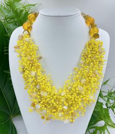 Big bold chunky multi strand handmade necklace. Yellow  beaded statement jewelry gift for women. You can wear this unique Yellow  gemstone jewelry day or evening. Fits perfectly into shirts or summer dresses This necklace can make even an everyday dress stunning. It will be the perfect gift for yourself and a wonderful woman around you. While designing my necklaces, I pay attention to multi-purpose use. It can be used for casual evening or wedding, it's up to you and your choices .  For wife, mo Yellow Multi-strand Jewelry Gift, Yellow Multi-strand Jewelry As A Gift, Yellow Multi-strand Necklace For Gift, Yellow Gemstone Beaded Necklaces For Gifts, Unique Yellow Jewelry With Gemstone Beads, Yellow Multi-strand Bohemian Jewelry, Yellow Beaded Necklaces With Natural Stones For Gifts, Yellow Beaded Necklaces With Natural Stones As Gift, Handmade Yellow Bohemian Bib Necklaces