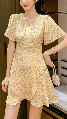 $49.90 -  Cute yellow floral short summer wrap front dress with v-Neck. For elegant ladies, teens and feminine women. Perfect for casual simple summer day outfit. Summer Floral Chiffon Dress With Short Sleeves, Chiffon Mini Dress With Short Sleeves, Yellow A-line Chiffon Dress, Elegant Yellow Floral Summer Dress, Yellow Chiffon Mini Dress, Floral Print Chiffon Mini Dress, Yellow A-line Mini Dress With Ruffles, Yellow Ruffled Feminine Dress, Feminine Yellow Ruffled Dress