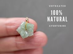 "A lovely hand-crafted tiny flower necklace made of UNTREATED natural aventurine- perfect for layering ♥ Skin SAFE- Natural aventurine without chemical treatment or dye. - MADE IN USA 14k gold-filled or sterling silver accent bead ♥ Chain adjustable from 14\" to 18\" and well suited for placing your pendant to exactly where you want it to be. MORE DAINTY JADE NECKLACES: https://etsy.me/2HYBwoF ----------- DETAILS - Natural aventurine, approx. 15 mm in diameter, thickness: approx. 3.5 mm - MADE I Jade Necklaces, Jade Necklace Pendant, Jade Design, Aventurine Jewelry, Jade Charm, Jade Pendant Necklace, Aventurine Necklace, Usa Jewelry, Beaded Pendant Necklace