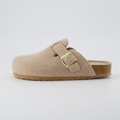 Meet Hana, a super comfy slip on clog. Featuring a flexible cork footbed fitted with a cushioned heel cup, Hana is the epitome of classic comfort. Hana's fully cushioned genuine suede insole will form a perfect contour of the foot after being worn in, while its soft faux wool upper comes with an adjustable strap, ensuring a great fit. Clog Outfit, Ugg Clogs, Outfit Repeater, Perfect Contour, Tasman Slippers, Wool Clogs, Mom Shoes, Ugg Tasman Slippers, Hospital Stay