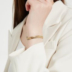 Statement chunky snake style gold bracelet. This bracelet is a perfect statement piece. You can wear it alone or layer it with other gold bracelets. A perfect addition to your jewelry collection! ………………………………….D E T A I L S• Materials: Stainless steel, 18k gold plating.• Length: 6 inches (15 cm) + extension 1.9 inches (5 cm)• Width: 5 mm• This product is hypoallergenic, water and tarnish resistant Elegant Everyday Gold-tone Bangle, Elegant Matte Gold Tarnish-resistant Bracelets, Chic Yellow Gold Bracelet, Chic Gold Cuff Bracelet Tarnish Resistant, Chic Gold Cuff Bracelet With Bracelet Strap, Trendy Yellow Gold Bangle For Formal Occasions, Elegant Matte Gold Bracelet, Elegant Matte Gold Plated Bracelet, Chic Gold Jubilee Bracelet