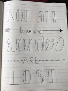 an open notebook with writing on it that says not all those who sander are lost