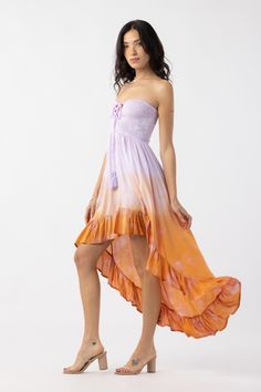 Embrace every moment in carefree style with lace up strings that can be tied in the front for a classic strapless fit or used to create a halter look. Featuring soft-fit comfort and draping fabric, the Aila Maxi Dress is a customizable piece designed to captivate. Details: 100% Rayon Hand wash cold & Lay flat to dry Features: Lace up sweetheart bodice, Can be worn strapless or halter, Ruffled high-low hemline Measures: Length from the top of the bodice to the shortest part of the hemline: approx Strapless Fitted Maxi Dress For Beachwear, Summer Strapless Fitted Dress With Tie Back, Fitted Strapless Maxi Dress For Beachwear, Strapless Summer Dress With Lace-up Back, Summer Fitted Strapless Dress With Tie Back, Fitted Strapless Summer Dress With Tie Back, Spring Fitted Maxi Dress With Drawstring, Summer Sleeveless Dress With Drawstring Tie, Spring Strapless Fitted Dress With Tie Back