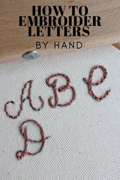 how to embroider letters by hand with the words abc and q on it