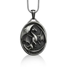 Dragon oval pendant necklace in sterling silver, Personalized fantasy necklace for best friend, Birthday gift necklace These 925K Sterling Silver Dragon with Open Wings Necklace has special handmade engraving details which photos are taken with original products. It's very elegant and classy for everyday use and gives stylish look to your outfits. Also, can be preferred as a gift for friends and family for an eternal memorial. Dream collection has many meanings behind its background; we prepare Fantasy Silver Necklace With Round Pendant, Fantasy Silver Round Pendant Necklace, Silver Round Pendant Necklace In Fantasy Style, Engraved Sterling Silver Necklace With Oval Pendant, Oval Necklaces With Oxidized Finish As Gift, Fantasy Style Engraved Necklaces For Gifts, Silver Fantasy Necklace For Gifts, Fantasy Style Silver Necklaces As A Gift, Fantasy Style Silver Necklaces For Gifts