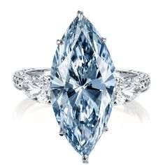 a blue and white diamond ring