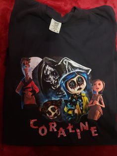 Hi Spooky Lovers ,check out our Comfort Colors, Unisex Adult , Heavyweight  100% Cotton  long sleeve Shirt.Our SPOOKy Coraline Shirt is  Just in time for Halloween,(Black size Large ) Stay Spooky  👻 Black Long Sleeve T-shirt For Costume Party, Black Themed Top With Sublimation Print, Themed Black Shirt With Character Print, Themed Long Sleeve Fan Merchandise Tops, Black Themed Long Sleeve T-shirt, Themed Long Sleeve Tops With Graphic Print, Spooky Long Sleeve Shirt For Halloween, Long Sleeve Shirt With Halloween Character Print, Black Long Sleeve Halloween Shirt