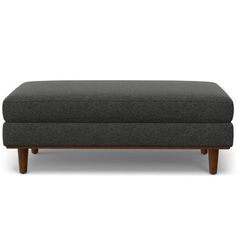 a grey ottoman with wooden legs on a white background