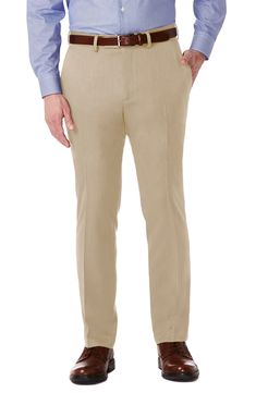 Slim-fit performance dress pants feature a flat front, subtle texture and a signature Rigid Waistband that provides a secure fit on your midsection. The moisture-wicking fabric has the added benefit of eliminating the need to iron making this pant a wardrobe staple. Zip fly with hook-and-bar closure Back besom pockets with button closure 100% polyester Machine wash cold, tumble dry low Imported Mens Dress Slacks, Black Dress Pants Men, Slim Dress Pants, Navy Blue Dress Pants, Mens Slacks, Grey Slacks, Slim Fit Dress Pants, Blue Dress Pants, Slim Suit