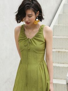 Long, A-line sleeveless dress in lightweight fabric. V-neck with drawstring and back zip.- Maxi- Sleeveless- A-line Summer A-line Dress With Tie Fastening, Summer Maxi Length Dress With Drawstring, Summer A-line Maxi Dress With Gathered Neckline, Sleeveless Green Mini Dress With Tie Straps, Green Summer Midi Dress With Gathered Neckline, Green Midi Dress With Gathered Neckline For Summer, Green Sleeveless Mini Dress With Tie Straps, Casual A-line Dress With Tie Back, Chic Sleeveless Mini Dress With Gathered Neckline