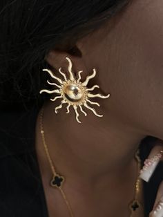 Sign up for our email list and receive 25% off your entire purchase.  Link to sign up: https://bit.ly/4cTm7Aw Embrace the warmth and energy of the sun with our stunning Sun-Shaped Earrings! These earrings are the perfect accessory to brighten your day and illuminate your style. Though they shimmer with the luxurious look of gold, these earrings are crafted from high-quality, lightweight materials, ensuring both comfort and durability. Features: Design: Intricate sun shape, capturing the radiant Gold Sun Earrings, Sun Color, Formal Earrings, Sun Earrings, Abstract Earrings, Gold Sun, Yellow Earrings, Big Earrings, Brighten Your Day