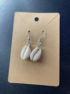 Cute sea shell earrings Elegant Nickel-free Hoop Earrings For Beach, Elegant Nickel-free Beach Earrings, Casual Shell Jewelry Gift, Elegant Nickel-free Earrings For The Beach, Shell-shaped Jewelry With Matching Earrings For The Beach, Single Dangle Earring For Beach, Dangle Earrings With Ear Wire For Vacation, Vacation Shell Dangle Jewelry, Shell Dangle Hoop Earrings For Beach