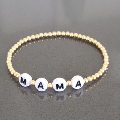 "* 3 mm Gold Filled (14/20) Beads * MAMA Bracelet -- Personalized with your name or message Available in Various Sizes. Please choose from drop down list. I make 6.5\" for most wrist size To determine your bracelet size: Measure with a tape around your wrist (where you would like the bracelet to sit). If you don't have access to a measuring tape, wrap a string around your wrist and measure the length with a ruler. This is your wrist size. To determine your bracelet size add 1/2\" for a snug fit Mama Bracelet, Stackable Jewelry, Personalized Letters, Measuring Tape, Perfect Gift For Mom, Bracelet Stack, Bracelet Sizes, Gift For Mom, Ruler