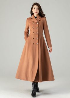 "FEATURES 50% wool, 50% wool blend Fully liner with polyester Two pockets Lapel collar Long sleeve Button closure in front For Winter, Autumn dry clean ★★Mode size Height 170cm (5′ 7″)  Bust 84 cm (33\")  Waist 66 cm (26\")  She wears size XS. ★★Bespoke Order Service If you Request other color Request the length Your height is not between 155 cm- 175 cm Your weight is not between 47 kg -77 kg I can do it for you, It will need some extra fee depending on on your need. Contact with me for more det Classic A-line Fall Outerwear, Formal A-line Outerwear For Fall, Formal A-line Fall Outerwear, Tailored A-line Outerwear For Winter, Solid A-line Outerwear For Fall, Tailored A-line Outerwear For Fall, Fall A-line Single Breasted Outerwear, Long Wool Coat With Double Button Closure For Fall, Fall Long Wool Coat With Double Button Closure